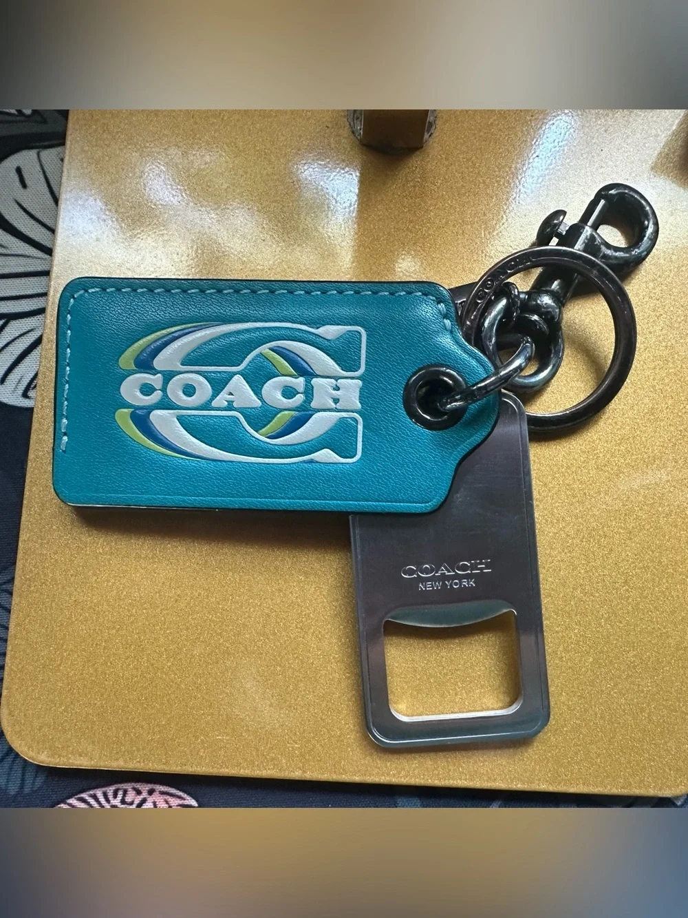 Coach Teal Bottle Opener with Gunmetal Hardware